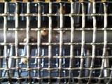 Détail de la Cage de l'érafloir, Grillage en fils tressés - Source CA33
